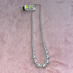 Faux pearls in graded sizes
